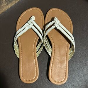 White and gold thong sandals